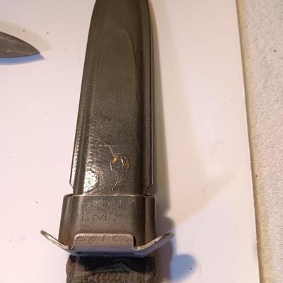 Vintage military issued Bayonet with scabbard marked US M8A1