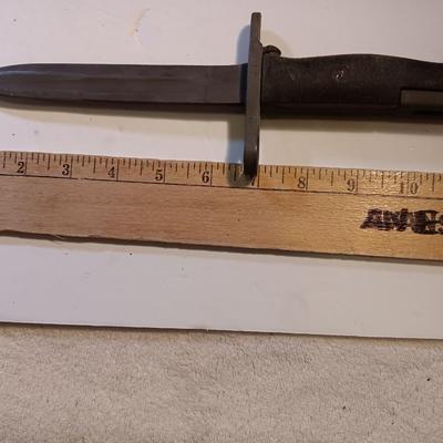 Vintage military issued Bayonet with scabbard marked US M8A1