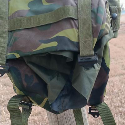 Military issued tactical vest with accessories.