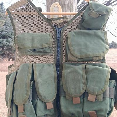 Military issued tactical vest with accessories.