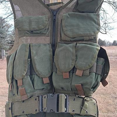 Military issued tactical vest with accessories.
