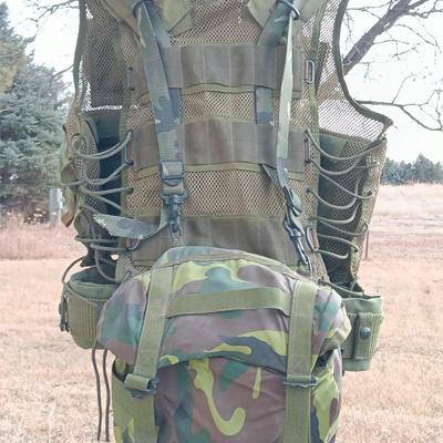 Military issued tactical vest with accessories.