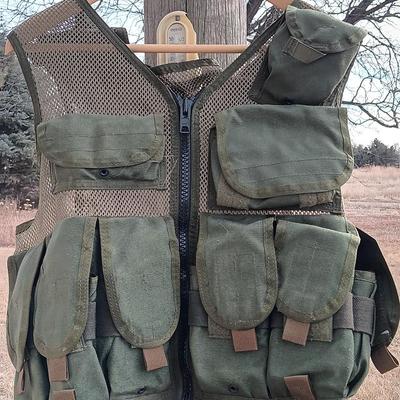Military issued tactical vest with accessories.