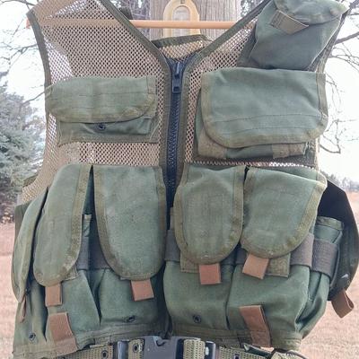 Military issued tactical vest with accessories.