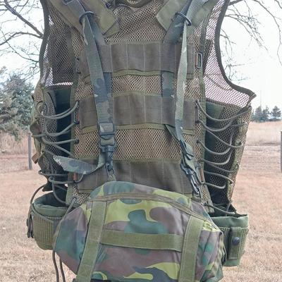 Military issued tactical vest with accessories.