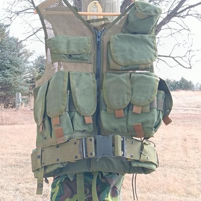 Military issued tactical vest with accessories.