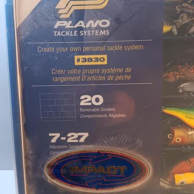Plano plastic storage organizing boxes for fishing tackle.