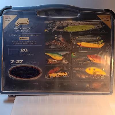 Plano plastic storage organizing boxes for fishing tackle.