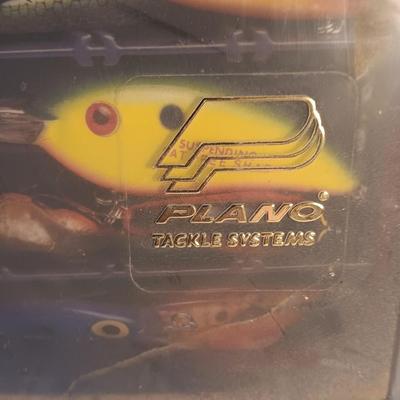 Plano plastic storage organizing boxes for fishing tackle.
