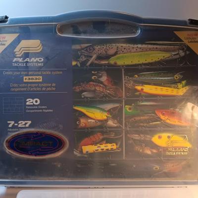 Plano plastic storage organizing boxes for fishing tackle.