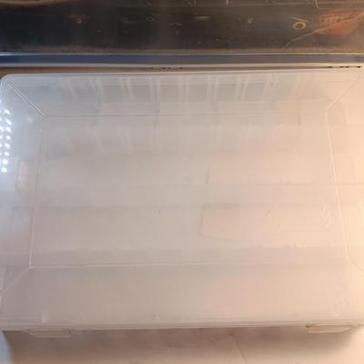 Plano plastic storage organizing boxes for fishing tackle.