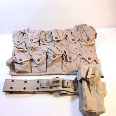 Military issue 1972 Magazine pouch and belt with ammunition multi pocketed pouch.