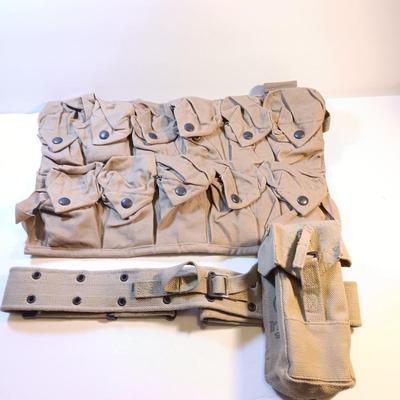Military issue 1972 Magazine pouch and belt with ammunition multi pocketed pouch.