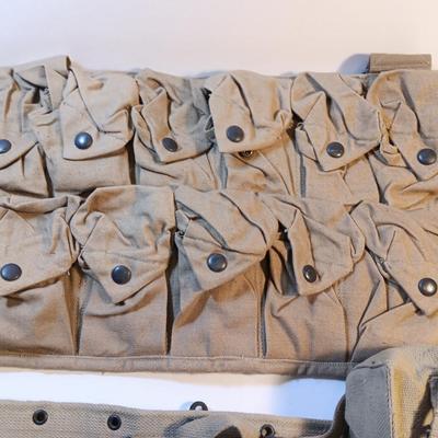 Military issue 1972 Magazine pouch and belt with ammunition multi pocketed pouch.