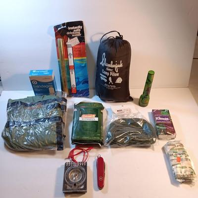Survival / Camping gear - Swiss army knife - compass- flashlights- safe drinking straw - paracord - rain jacket and more