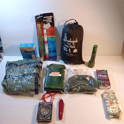 Survival / Camping gear - Swiss army knife - compass- flashlights- safe drinking straw - paracord - rain jacket and more