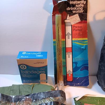 Survival / Camping gear - Swiss army knife - compass- flashlights- safe drinking straw - paracord - rain jacket and more