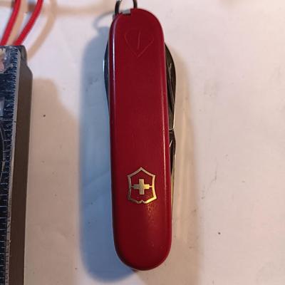 Survival / Camping gear - Swiss army knife - compass- flashlights- safe drinking straw - paracord - rain jacket and more