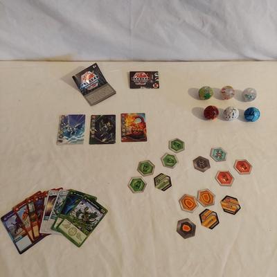 Beyblade Battle Tops and Motor Strike Beystadium Plus Bakugan Battle Game (B2-BBL)