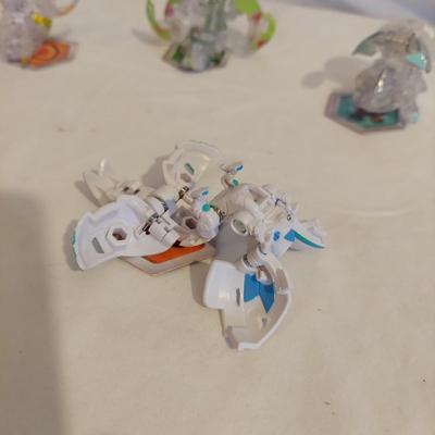 Beyblade Battle Tops and Motor Strike Beystadium Plus Bakugan Battle Game (B2-BBL)
