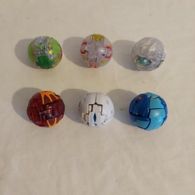 Beyblade Battle Tops and Motor Strike Beystadium Plus Bakugan Battle Game (B2-BBL)