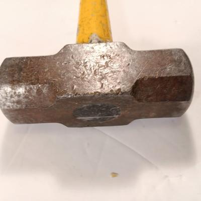 GRIP fabric tape measure with fiberglass handled 3.3 LB sledge hammer.
