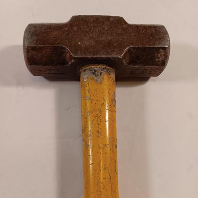 GRIP fabric tape measure with fiberglass handled 3.3 LB sledge hammer.