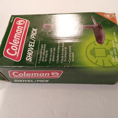 Vintage thermos with raincoat aluminum drinking cup and a folding coleman shovel pick