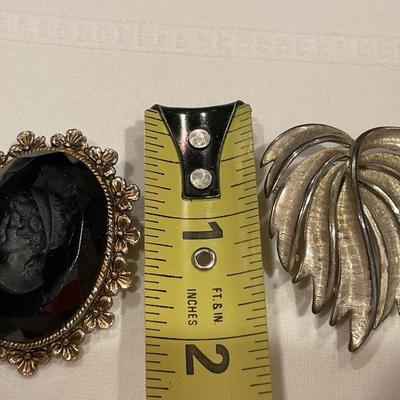 Cameo & leaf brooches