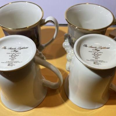 Set of 4 Lenox the Seaside Lighthouse Mugs Fine Ivory China 2004 by Thomas Kinkade Mugs in VG Condition.