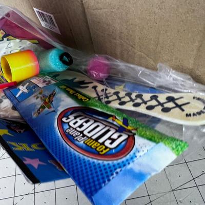About a Dozen PARTY IN A BAG: Toys; Paddle Ball, Slinky, etc. 