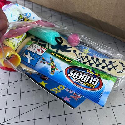 About a Dozen PARTY IN A BAG: Toys; Paddle Ball, Slinky, etc. 