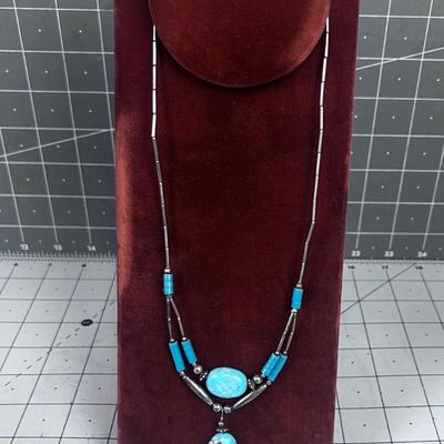 Turquoise Polished ovals with Liquid Silver 