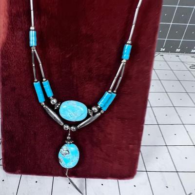 Turquoise Polished ovals with Liquid Silver 
