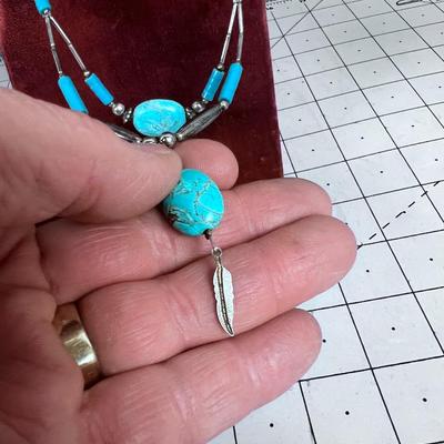 Turquoise Polished ovals with Liquid Silver 