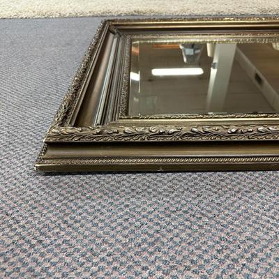 BEAUTIFUL BEVELED MIRROR WITH A BROWN ORNATE FRAME