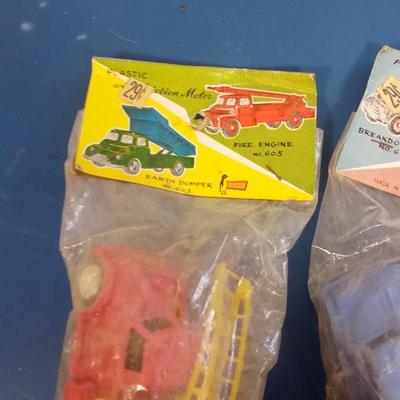 LOT 149 TWO OLD TOY TRUCKS