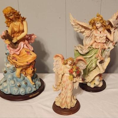 Glass angels with wooden base
