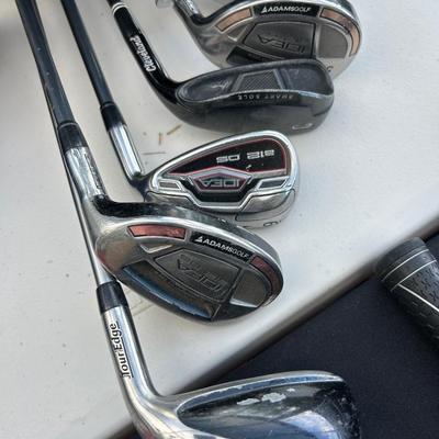 Golf clubs by pinging, two lots of golf bags with golf clubs