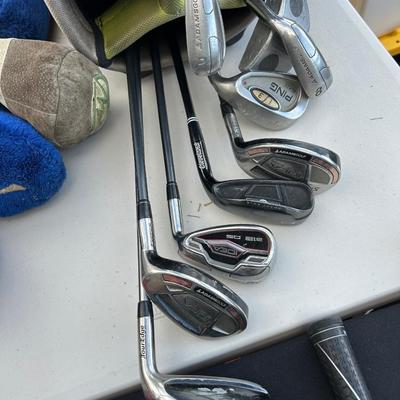 Golf clubs by pinging, two lots of golf bags with golf clubs