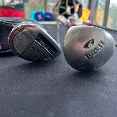 Golf clubs by pinging, two lots of golf bags with golf clubs