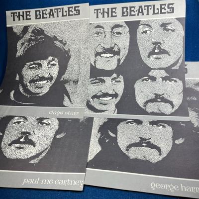 SET OF 4 BLACK AND WHITE PHOTOS OF BEATLES with SHEET MUSIC ON THE BACK