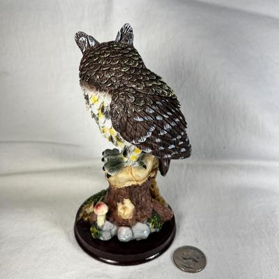 SCULPTED OWL FIGURINE ON TREE STUMP WITH MUSHROOMS, ROCKS. FLORA