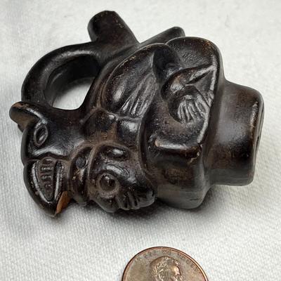 MESO-AMERICAN THEMED CLAY FIGURAL BOTTLE STOPPER?
