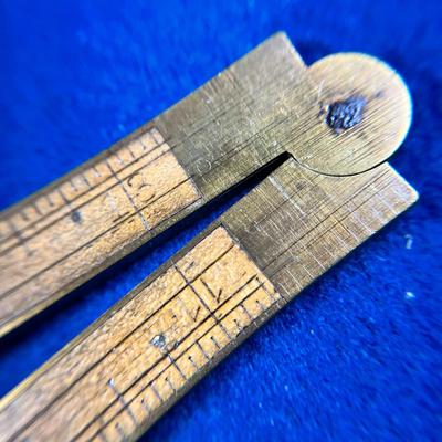 ANTIQUE WOOD AND BRASS FOLDING RULER