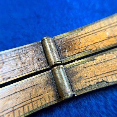 ANTIQUE WOOD AND BRASS FOLDING RULER