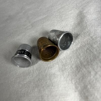 TRIO OF ASSORTED THIMBLES:  2 TIN, 1 BRASS, PARKO GASOLINE, GOLD THIMBLE SCOTCH, LA CITTA NOVA 