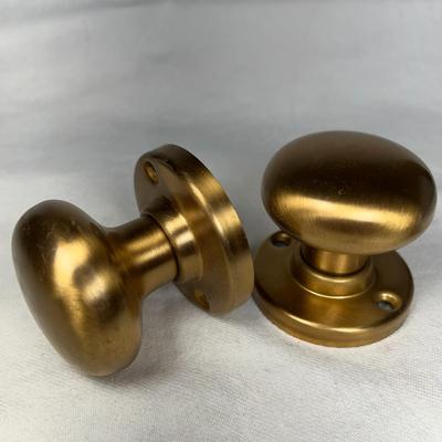CLOSET SET OF BRASS DOOR HANDLES, NEW IN BOX with SPRING LOADED BALL CLOSER