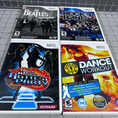 4 Wii Games; Rock, Band and Dance 