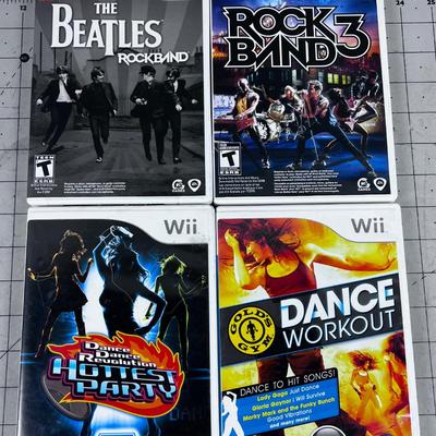 4 Wii Games; Rock, Band and Dance 